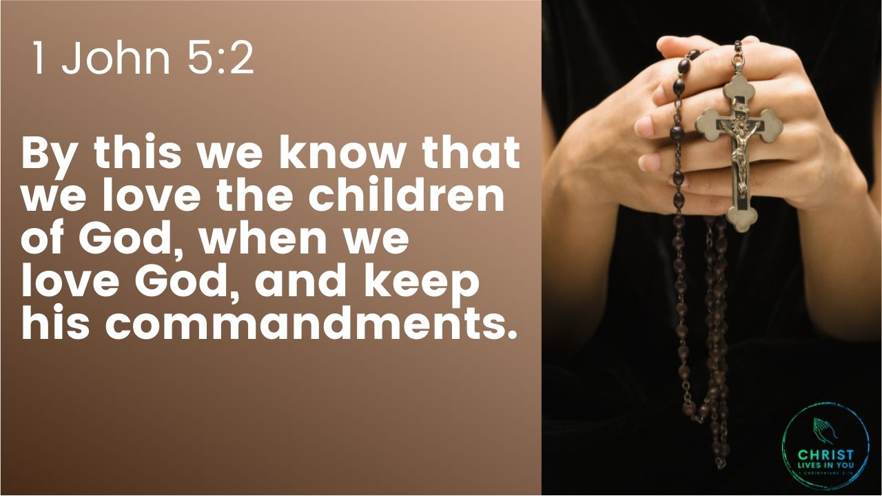 A woman holds a rosary